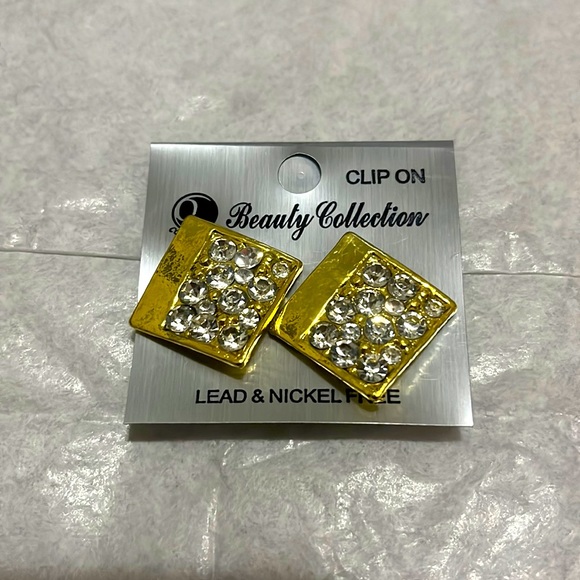 Gold Clip-On Earrings - Picture 1 of 2